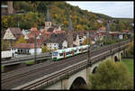 Ein Doppel Triebwagen der Erfurter Bahn macht sich hier am 26.2.2023 um 13.28 Uhr in Gemünden am Main auf den Weg nach Bad Kissingen.