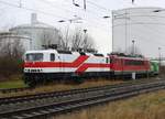 Werkslok 312 109-2 rangiert EBS 143 822-5 / 243 822-4 und 155 195-1 FWK vom Betriebsgelände über die Wüst in den Bf Anklam am 04.01.2021