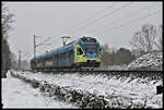 RB 66 mit ET 9.04 der Eurobahn hat hier gerade am 1.4.2022 um 10.50 Uhr den Bahnhof Hasbergen verlassen und ist am Ortsrand unterwegs nach Osnabrück HBF.