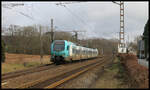 In Form des ET 4.04 fährt hier die Eurobahn am 12.2.2023 um 12.32 Uhr in Richtung Rheine durch den ehemaligen Bahnhof Velpe.