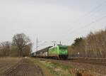 185 404-1 zieht am 12.04.2022 einen Güterzug durch Halstenbek 