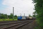 185 521-2 bringt einen Kesselwagenzug in Richtung Norden. Aufgenommen am 27.07.2010 in Eschwege West.