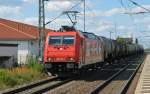 185 588 zog am 12.08.12 einen Kesselwagenzug durch Delitzsch u. Bf in Richtung Halle(S).