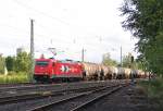 185 631-9 der HGK mit Kesselwagenzug in Fahrtrichtung Norden. Aufgenommen am 13.07.2012 in Eschwege West.