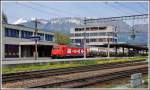 HGK 185 588-1 rauscht mit einem Dyckerhoff Ganzzug durch Buchs SG. (29.04.2015)