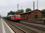 185 587-3 der HGK mit Autotransportwagen in Fahrtrichtung Norden. Aufgenommen in Eystrup am 22.07.2014.