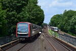 In Eppendorfer Baum fährt DT5 336-3 als U4 ein. Während ein DT4 als U1 soglich im Tunnel untertaucht. Das Bild wurde vom Bahnsteig Ende bei Eppendorfer Baum gemacht.

Hamburg 27.07.2021