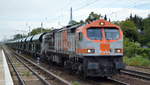 hvle mit  V330.7  (NVR:  92 80 1250 005-6 D-HVLE ) und Schüttgutwagenzug am 29.09.20 Berlin Hirschgarten.