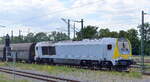Havelländische Eisenbahn AG, Wustermark [D] mit der Voith Maxima 30 CC  [NVR:  92 80 1 263 004-4 D-VTLT ] und einem Ganzzug Schüttgut-Selbstentladewagen am 10.06.22 Durchfahrt Dessau Hbf.