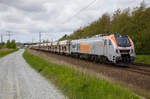 HVLE 159 009 mit einer langen Leine Schüttgutwagen am 17.05.2023 in Teschenhagen.