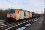 285 102-0 der hvle durchfhrt mit einem Ganzzug Autotransportwagen den Haltepunkt Magdeburg-Herrenkrug. Der Zug kam aus Richtung Biederitz, fotografiert am 01.02.2010. 