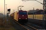 185 606-1 (HGK 2064) der HGK - Hfen und Gterverkehr Kln AG mit einem Kesselzug fr Umweltgefhrdenden Stoffen in flssiger Form in Rathenow Richtung Wustermark unterwegs.