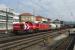 Lok DH701 der HGK mit einer DB 185 vor einem gemischten Gterzug am 28.08.2008 in Regensburg Hbf.