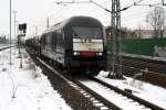 ER 20-005 der PCT Altmann mit leerem Autozug kurz vor Rathenow am 24.2.2010