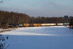 MRCE Mietlok Siemens Vectron für PCT tätig mit Transportzug bei der Durchfahrt bei Zorneding am 10.01.17.