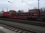 Am 13.12.2015 in Bamberg Hbf. aufgenommen: Ein Rnoos 644 , Wagennummer 37 80 3521 230-7 RIV D-DB mit dem Vermerk  SNI . demnach benutz diesen Waggon die DB-Tochter  DB Schenker Nieten Gmbh, die auf Holztransporte spezialisiert ist. 