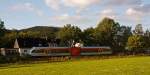 Im frhen Abendlicht in Neunkirchen-Altenseelbach am 14.09.2011 ein Stadler GTW 2/6 der Hellertalbahn kommt vom Neunkirchen und fhrt Richtung Herdorf bzw. Betzdorf/Sieg.