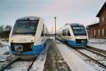 Winter in Mecklenburg wie hier im Bahnhof von Crivitz an der Strecke Rehna- Schwerin- Parchim mit einer Zugkreuzung zweier TW Lint der Mecklenburgbahn ( OLA ) im Januar 2003 .