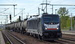 MRCE Dispolok   187 101  [NVR-Nummer: 91 80 6187 101-1 D-DISPO], aktueller Mieter? mit Kesselwagenzug (leer) Richtung Stendell am 05.10.22 Durchfahrt Bahnhof Flughafen BER Terminal 5.