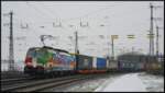 DISPO  Connected by Rail  193 640-0 (X4 E-640) mit einem Containerzug am 18.12.2022 bei der Einfahrt in den Würzburger Hauptbahnhof.