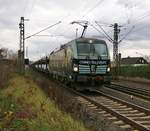 193 875 mit offenen ARS-Autotransportwagen in Fahrtrichtung Kassel. Aufgenommen in Lispenhausen am 14.11.2015.