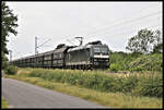 Mit dem Captrain Kohlependel kam am 17.6.2022 die MRCE Lok 185556-6 um 14.37 Uhr in Richtung Norden fahrend durch Hasbergen.