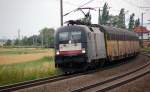 ES 64 U2 - 033 zog am 02.07.11 einen leeren Autozug durch Niemberg Richtung Halle(S).