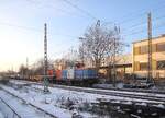 NBE 212 256-2 am 05.01.2010 mit einem Bauzug in Wiesbaden-Schierstein.