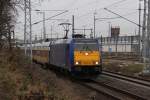 146 522-8 mit InterConnex 68904 von Warnemnde nach Leipzig Hbf kurz nach der Ausfahrt im Rostocker Hbf.im Hintergrund das BW   Rostock Hbf/Dahlwitzhof und der Wasserturm.08.12.2011