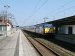 146 520 und der X 68903 Leipzig-Warnemnde,am 23.April 2011,im Neustrelitzer Hbf.