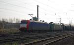 185-CL 003 mit 185-CL 006 als Wagenlok und einem Kesselwagenzug in Fahrtrichtung Norden durch Eschwege West. Aufgenommen am  27.11.2010.