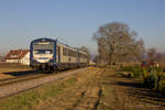 SWEG VT 126 und VS 202 passieren auf ihrem Weg nach Riegel die Aussiedlerhöfe bei Endingen. Aufgenommen am 14.12.2016.