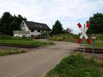 Interessanter SWEG-Bahnbergang - Teil 2: Ein eigener Bahnbergang kann dieses bewohnte Grundstck vorweisen.