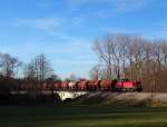 Am 9.12.13 kam der Salzzug der Hohenzollerischen Landesbahn von Stetten bei Haigerloch nach Ulm Rbf mit einer (normalen) Verspätung von etwa einer Stunde vorbei. 
Aufgenommen wurde der Zug am ehemaligen Bahnhof Lindich-Weilheim bei der Überfahrt der Brücke über die Starzel. 