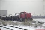 DFG 84127 steht im Januar 2003 mit Kessel- und Containerwagen sowie mir der Zuglok G1206 von Hoyer in Brunsbttel und wartet auf die Abfahrt nach Hamburg-Billwerder.