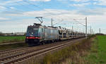 Der HSL-Nightrider 185 601 rollte am 20.10.19 mit einem Autozug von Falkenberg nach Rheinhausen durch Rodleben Richtung Magdeburg.