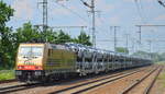 HSL Logistik GmbH mit  185 597-2  [NVR-Nummer: 91 80 6185 597-2 D-BRLL] und PKW-Transportzug (fabrikneue TOYOTA Modelle) am 04.06.19 Golm (Potsdam) Richtung Frankfurt/Oder.