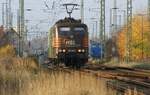 HSL 151 138-5 | Lz ab nach Norden | im Hintergrund schickt sich 312 323 9 an, die von 151 138  angelieferten Kesselwaggons zu holen | Anklam | November 2022