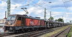 HSL Logistik GmbH, Hamburg [D]  mit ihrer  187 536  [NVR-Nummer: 91 80 6187 536-8 D-HSL] und einem PKW-Transportzug am 19.07.23 Höhe Bahnhof Magdeburg-Neustadt.