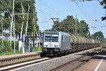 RHEINE (Kreis Steinfurt), 20.07.2016, 185 671-5 der HSL Logistik GmbH vor einem Güterzug in Richtung Münster bei der Durchfahrt durch den Bahnhof Rheine-Mesum