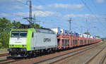 ITL Eisenbahngesellschaft mbH mit  185 517-0  [NVR-Nummer: 91 80 6185 517-0 D-ITL] und PKW-Transportzug (VW-Nutzfahrzeuge aus polnischer Produktion) am 01.07.19 Saarmund Bahnhof.