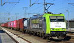 ITL - Eisenbahngesellschaft mbH, Dresden [D] mit  185 548-6  [NVR-Nummer: 91 80 6185 548-5 D-ITL] und Containerzug am 01.03.22 Durchfahrt Bf. Golm (Potsdam).