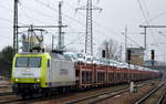 Captrain/OTL 145 095-6 mit PKW-Tranportzug (fabrikneue VW Nutzfahrzeuge aus polnischer Produktion) am 15.02.18 Bf. Flughafen Berlin-Schönefeld.