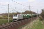 185 584-5 der ITL mit einem Ganzzug Schttgutwagen. Der Zug fhrt in Richtung Braunschweig. Fotografiert am 16.04.2010 in Magdeburg Diesdorf. 