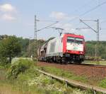 185 650-9 mit Silowagenzug in Fahrtrichtung Sden. Am Zugschluss hing noch die V142 der RBB. Aufgenommen zwischen Friedland(HAN) und Eichenberg am 04.06.2011.