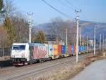 Lokomotion 185 666  Der kleine Nils  war fr die SLB unterwegs und ist hier mit dem 61825 bei Salzburg-Sd zu sehen.