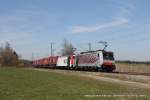 186 284-6 (Lokomotion) und 185 665-7 mit einem Sattelaufliegerzug in Ostermünchen, 27.