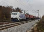 Die 185 661 von Lokomotion am 31.10.2009 mit dem Winner KLV-Zug bei der Durchfahrt in Haar (Mnchen)

