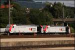 185 664 und 185 665 von Lokomotion trgt werbung fr Kombiverkehr. (08.08.2009 in Kufstein).