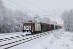 185 665 mit einem Stahlzug am 21.01.2012 in Haar.